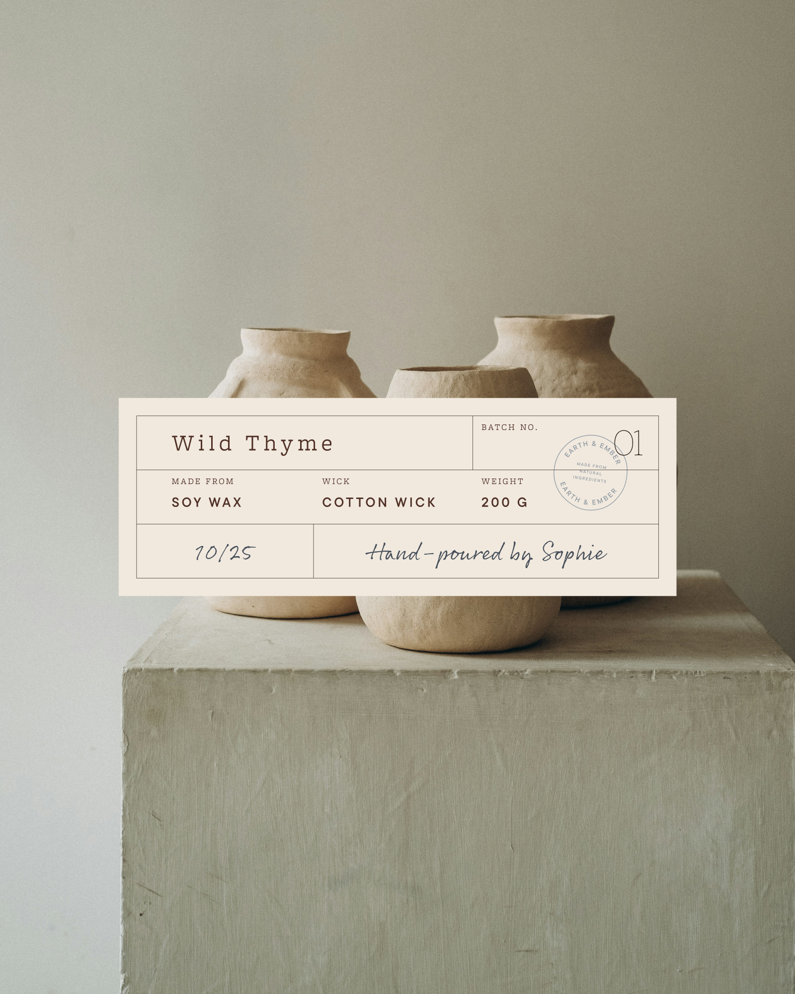 Earth & Ember Wild Thyme candle label with jars in the background