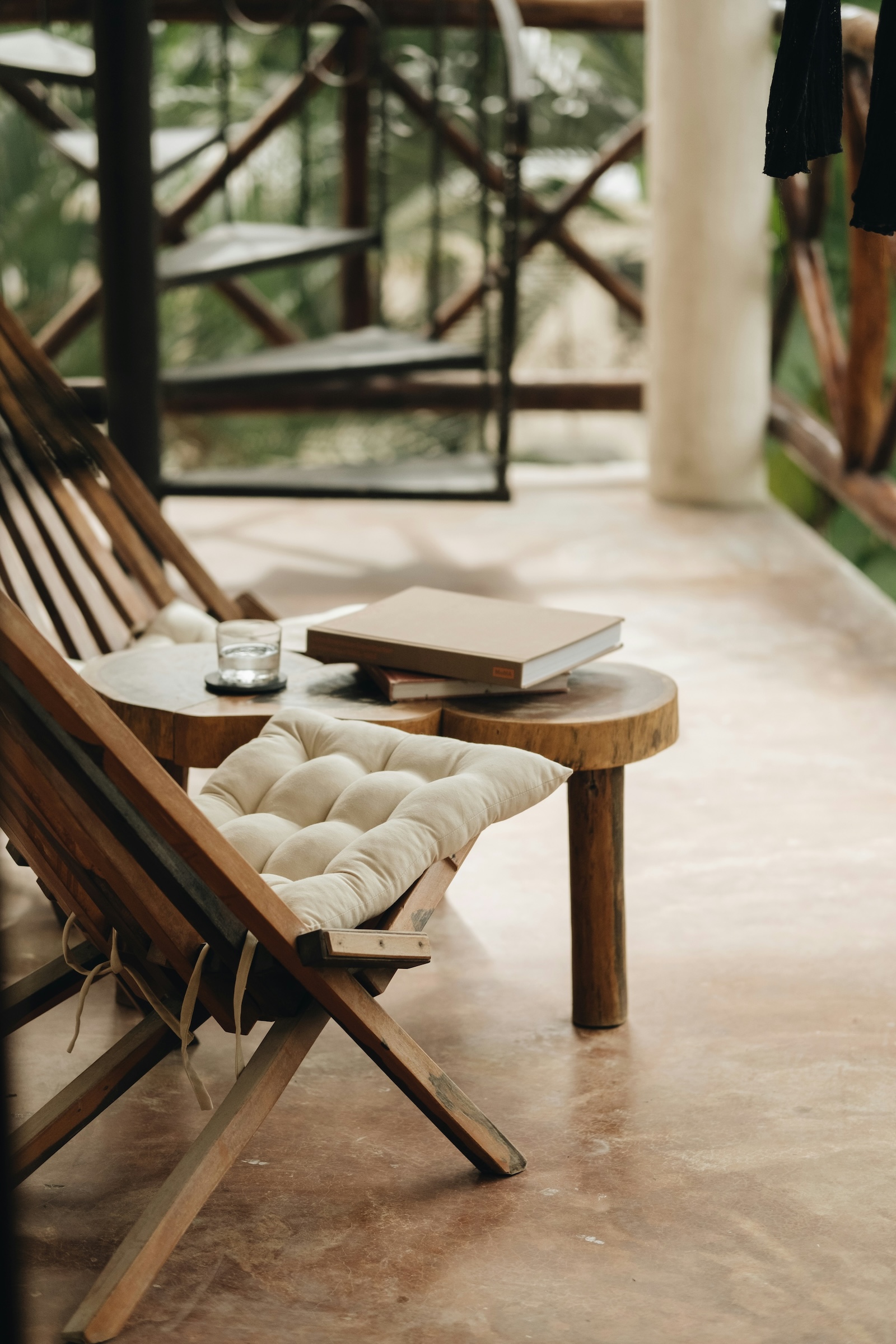 Cozy lounge corner with a wooden chair and side table